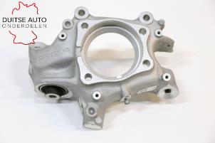 Gebruikte Fusee houder links-achter Audi E-tron Sportback (GEA) S Prijs op aanvraag aangeboden door Duitse Auto Onderdelen