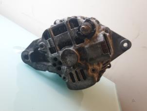 Gebruikte Dynamo Mitsubishi Colt (Z2/Z3) 1.3 16V Prijs € 40,00 Margeregeling aangeboden door Umit Sloperij