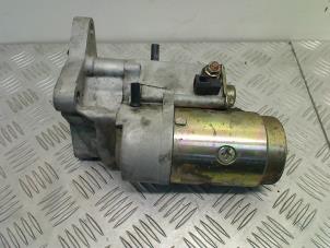 Gebruikte Startmotor Mazda 323 (BJ12) 2.0 DiTD 16V Prijs € 40,00 Margeregeling aangeboden door Autohandel & Demontage Weteringbrug