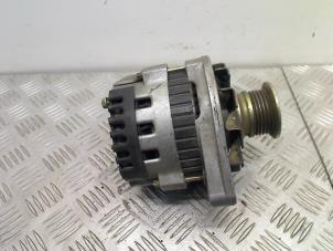 Gebruikte Dynamo Daewoo Nexia 1.5 GL 8V Prijs € 30,00 Margeregeling aangeboden door Autohandel & Demontage Weteringbrug