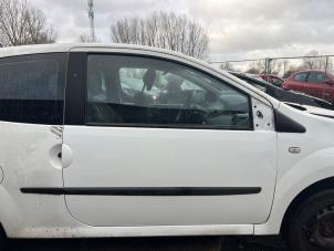 Gebruikte Deur 2Deurs rechts Renault Twingo II (CN) 1.2 16V Prijs € 75,00 Margeregeling aangeboden door Autohandel & Demontage Weteringbrug