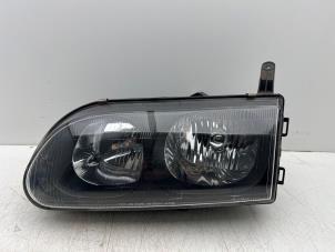 Gebruikte Linker Koplamp Mitsubishi L-400 2.5 TD Prijs € 30,00 Margeregeling aangeboden door Autohandel & Demontage Weteringbrug