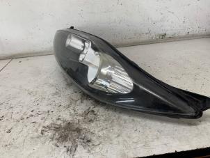 Gebruikte Koplamp links Ford Fiesta 6 (JA8) 1.25 16V Prijs € 150,00 Margeregeling aangeboden door Het Viaduct