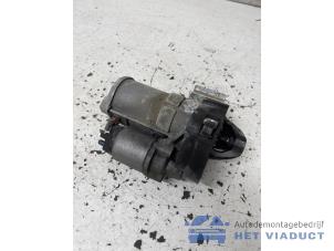 Startmotor van een BMW M1 (F21) M140i 3.0 24V 2016
