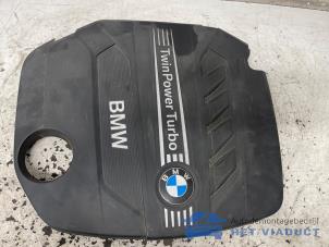 Gebruikte Afdekplaat motor BMW 1 serie (F21) 116d 1.6 16V Efficient Dynamics Prijs € 25,00 Margeregeling aangeboden door Het Viaduct