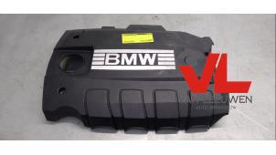 Gebruikte Afdekplaat motor BMW 1 serie (E81) 118i 16V Prijs € 28,00 Margeregeling aangeboden door Van Leeuwen Auto Onderdelen