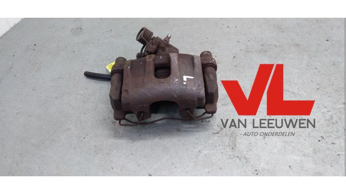 Remklauw (Tang) links-achter van een Ford Focus 3 1.0 Ti-VCT EcoBoost 12V 100 2013