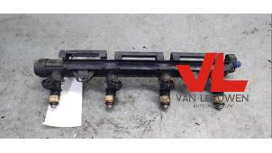Gebruikte Injector brug Volkswagen Polo IV (9N1/2/3) 1.4 16V Prijs € 70,00 Margeregeling aangeboden door Van Leeuwen Auto Onderdelen