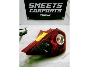 Gebruikte Achterlicht rechts Opel Corsa D 1.2 16V Prijs € 14,94 Margeregeling aangeboden door Smeets Autos Venlo