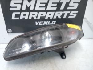 Gebruikte Koplamp links Opel Omega B Caravan (21/22/23) 2.2 16V Prijs € 34,94 Margeregeling aangeboden door Smeets Autos Venlo
