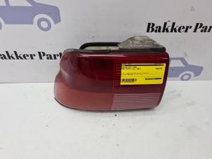 Gebruikte Achterlicht links Ford Escort 6 (AAL/ABL) 1.6 16V 4x4 Prijs € 20,00 Margeregeling aangeboden door Bakker Parts