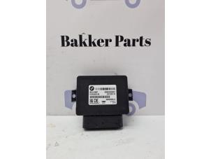 Gebruikte Handrem Module BMW 5 serie Touring (F11) 520d 16V Prijs € 50,00 Margeregeling aangeboden door Bakker Parts