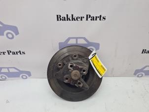 Gebruikte Fusee links-achter Renault Grand Scénic III (JZ) 1.2 16V TCe 130 Prijs € 45,00 Margeregeling aangeboden door Bakker Parts