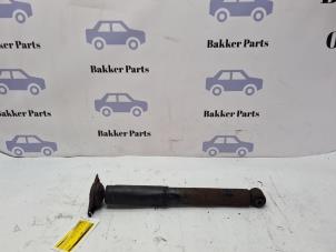 Gebruikte Schokdemperpoot links-achter Ford S-Max (GBW) 2.5 Turbo 20V Prijs € 25,00 Margeregeling aangeboden door Bakker Parts
