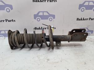 Gebruikte Mac Phersonpoot links-voor Peugeot 308 (L3/L8/LB/LH/LP) 1.2 12V VTi PureTech 82 Prijs € 60,00 Margeregeling aangeboden door Bakker Parts