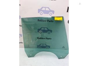 Gebruikte Deurruit 4Deurs rechts-achter Ford B-Max (JK8) 1.0 EcoBoost 12V 125 Prijs € 30,00 Margeregeling aangeboden door Bakker Parts