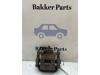 Nissan Qashqai (J10) 1.6 dCi Pure Drive Remklauw (Tang) links-achter