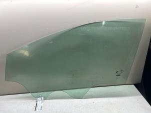 Gebruikte Deurruit 4Deurs links-voor Ford Puma 1.0 Ti-VCT EcoBoost mHEV 12V Prijs € 72,60 Inclusief btw aangeboden door JCR Janssen Car Recycling