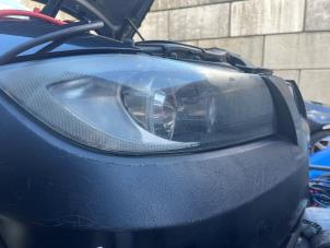 Gebruikte Koplamp rechts BMW 3 serie Touring (E91) 318i 16V Prijs € 84,99 Margeregeling aangeboden door JCR Janssen Car Recycling