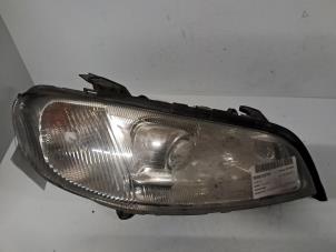 Gebruikte Koplamp rechts Opel Omega B (25/26/27) 2.0 DTi 16V Prijs € 84,70 Inclusief btw aangeboden door De Jonghe Recuparts