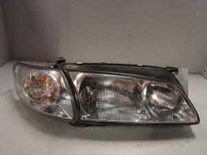 Gebruikte Koplamp rechts Mazda 626 Prijs € 60,50 Inclusief btw aangeboden door De Jonghe Recuparts