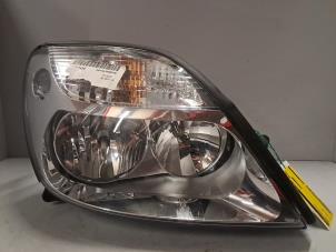 Gebruikte Rechter Koplamp Renault Scenic Prijs € 48,40 Inclusief btw aangeboden door De Jonghe Recuparts