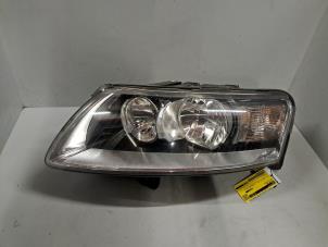 Gebruikte Linker Koplamp Audi A6 (C6) 2.0 T FSI 16V Prijs € 151,25 Inclusief btw aangeboden door De Jonghe Recuparts