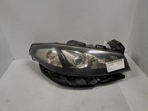Gebruikte Rechter Koplamp Renault Laguna Coupé (DT) Prijs € 121,00 Inclusief btw aangeboden door De Jonghe Recuparts