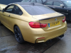 BMW M4 Sloopvoertuig (2015, Goud)
