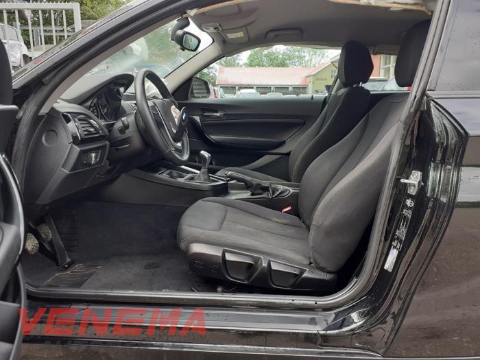 BMW 1 serie 114i 1.6 16V Sloopvoertuig (2014, Zwart, Saffierzwart)