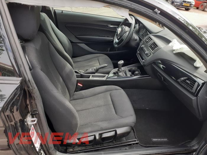 BMW 1 serie 114i 1.6 16V Sloopvoertuig (2014, Zwart, Saffierzwart)