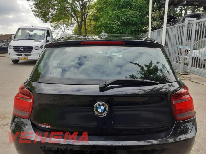BMW 1 serie 114i 1.6 16V Sloopvoertuig (2014, Zwart, Saffierzwart)