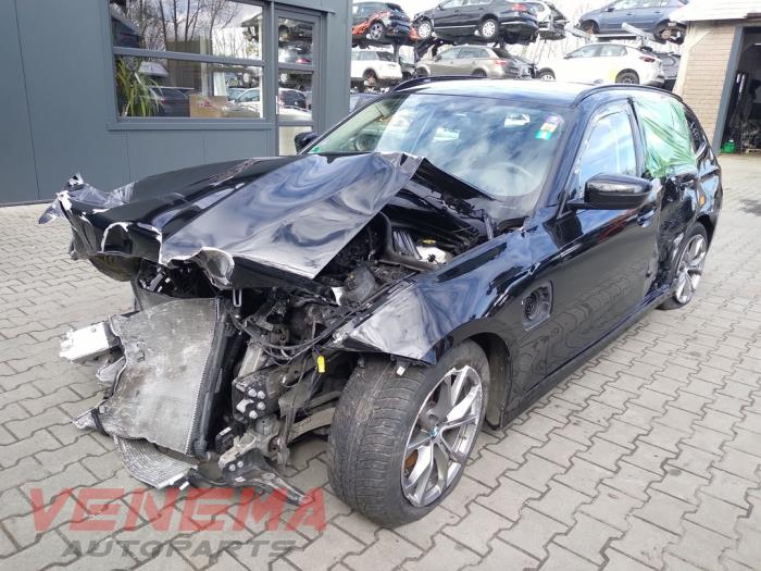BMW 3 serie Touring 320e xDrive 2.0 TwinPower Turbo 16V Sloopvoertuig (2022, Zwart)