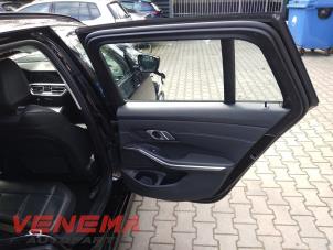 BMW 3 serie Touring 320e xDrive 2.0 TwinPower Turbo 16V Sloopvoertuig (2022, Zwart)