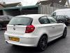 BMW 1 serie 118i 16V Schadevoertuig (2009, Wit)