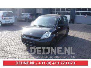 Daihatsu Sirion Aandrijfas links-voor O318331 Donorvoertuig