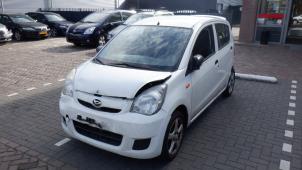 Daihatsu Cuore Bremszange links vorne O325396 Spenderfahrzeug