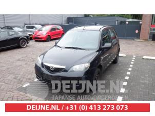 Mazda 2 Gasdemper links-achter O423653 Donorvoertuig