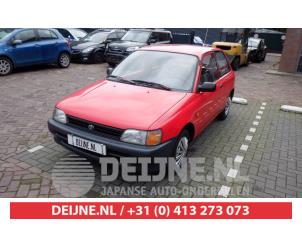 Toyota Starlet Achterschermlijst O421527 Donorvoertuig