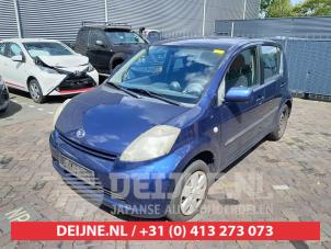 Daihatsu Sirion Aandrijfas links-voor O558801 Donorvoertuig