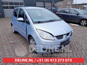 Mitsubishi Colt Aandrijfas links-voor O583424 Donorvoertuig