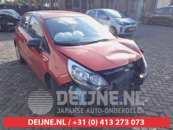 Kia Rio III 1.2 CVVT 16V Sloopvoertuig (2015, Rood)