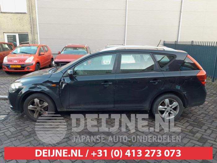 Kia Cee'd Sporty Wagon 1.4 16V Sloopvoertuig (2010, Zwart)