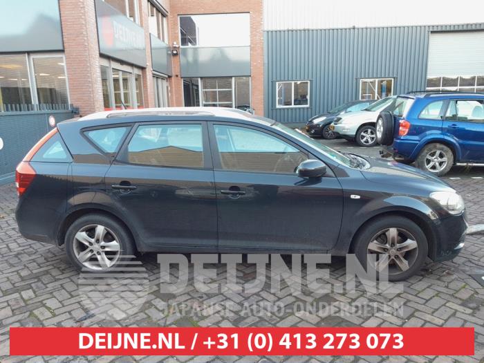 Kia Cee'd Sporty Wagon 1.4 16V Sloopvoertuig (2010, Zwart)