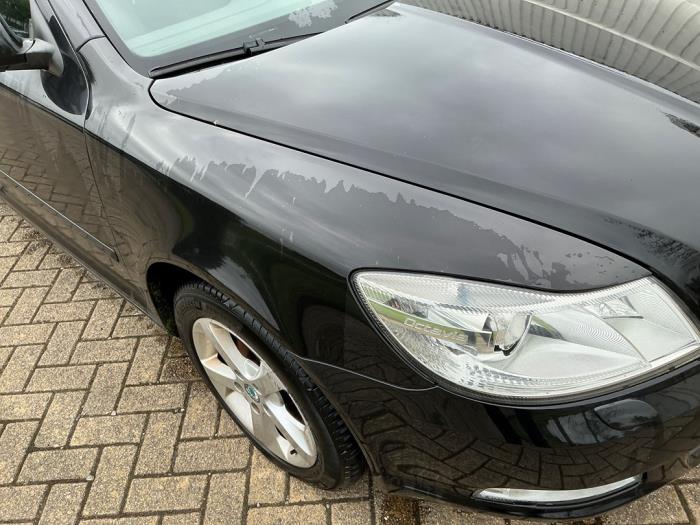 Skoda Octavia Combi 1.2 TSI Sloopvoertuig (2011, Metallic, Zwart)