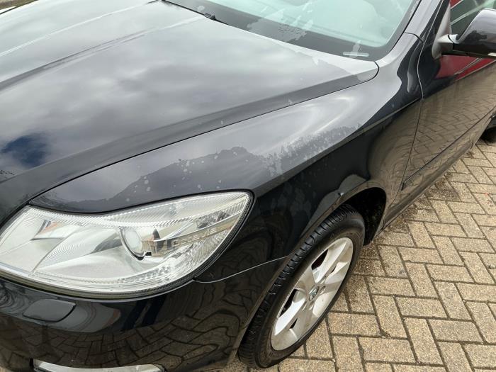 Skoda Octavia Combi 1.2 TSI Sloopvoertuig (2011, Metallic, Zwart)