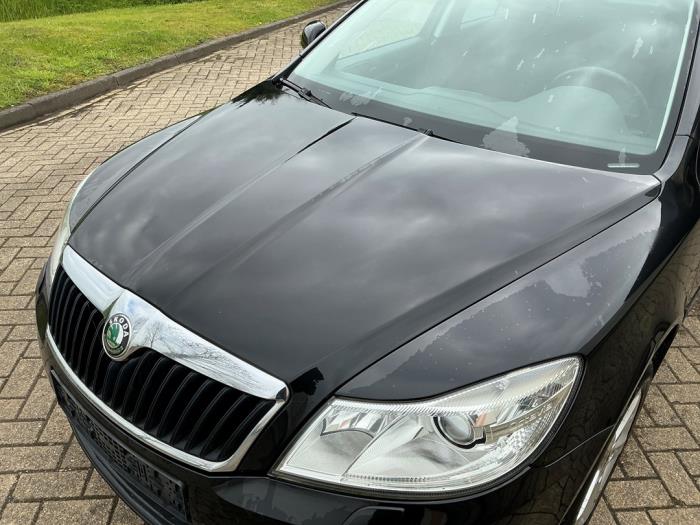 Skoda Octavia Combi 1.2 TSI Sloopvoertuig (2011, Metallic, Zwart)