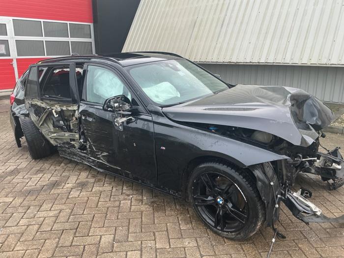 BMW 3 serie Touring 320d xDrive 2.0 16V Sloopvoertuig (2019, Metallic, Zwart)