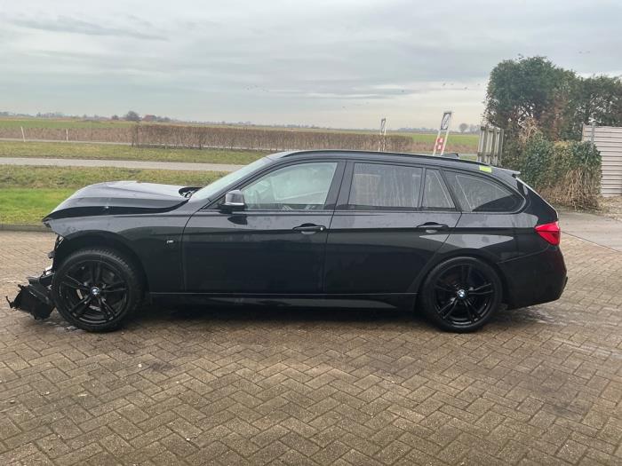 BMW 3 serie Touring 320d xDrive 2.0 16V Sloopvoertuig (2019, Metallic, Zwart)