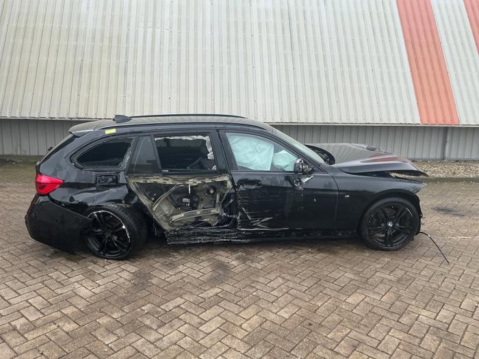 BMW 3 serie Touring 320d xDrive 2.0 16V Sloopvoertuig (2019, Metallic, Zwart)